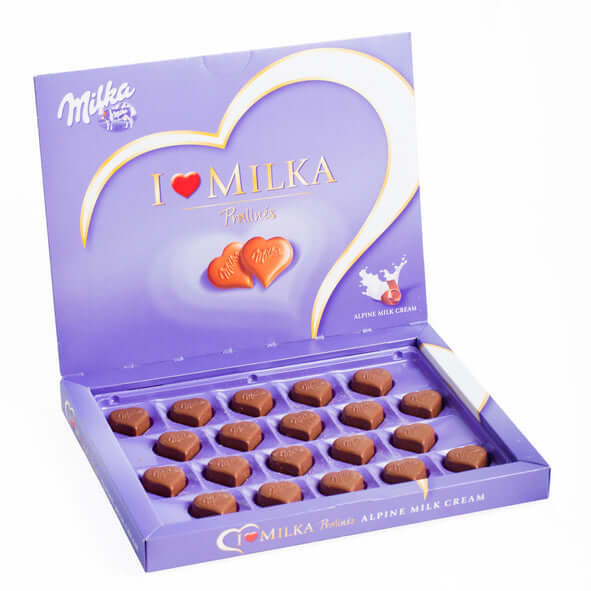 Milka Herzen Pralinen Box with heart-shaped chocolates perfect for gifting or enjoying.
